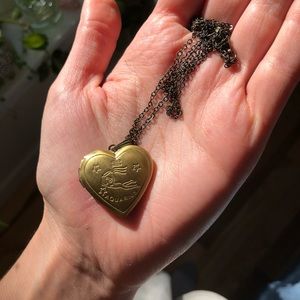 Aquarius gold locket heart shaped